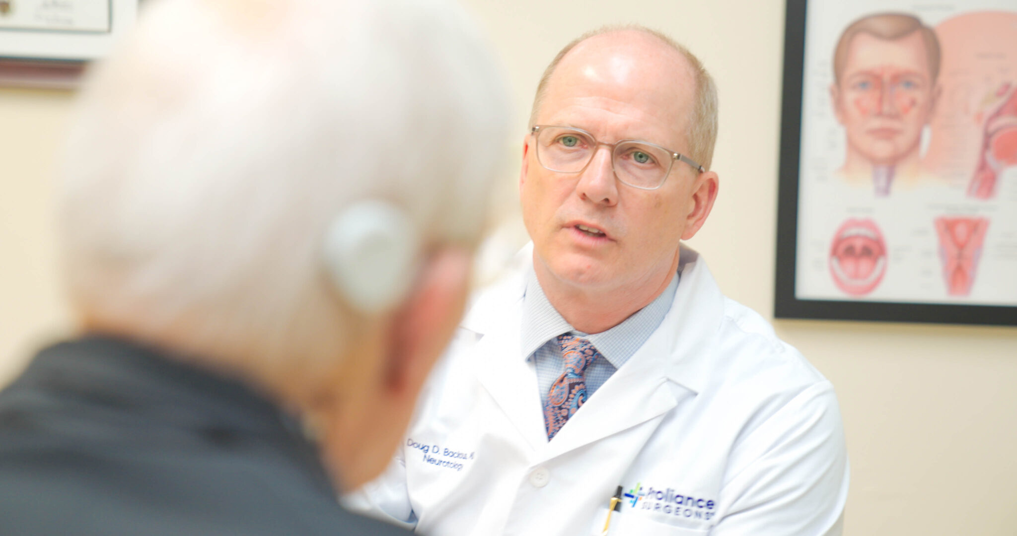 couple treating hearing loss with implants